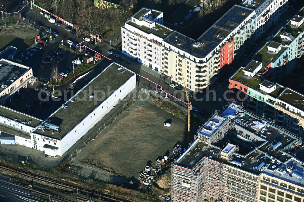 Berlin from above - Construction site to build a new office and commercial building The Frame on street Revaler Strasse in the district Friedrichshain in Berlin, Germany