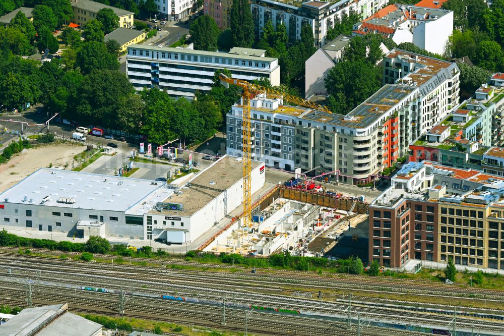 Berlin from above - Construction site to build a new office and commercial building The Frame on street Revaler Strasse in the district Friedrichshain in Berlin, Germany