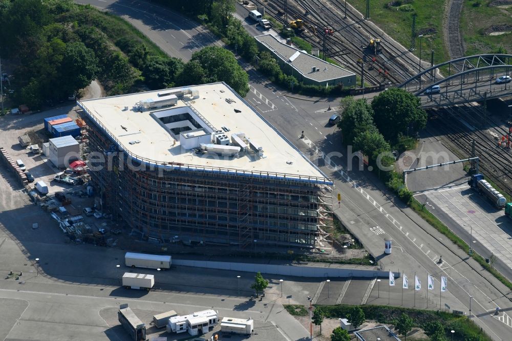 Freiburg im Breisgau from the bird's eye view: Construction site to build a new office and commercial building of Freiburg Wirtschaft Touristik and Messe GmbH & Co. KG on Hermann-Mitsch-Strasse in Freiburg im Breisgau in the state Baden-Wuerttemberg, Germany