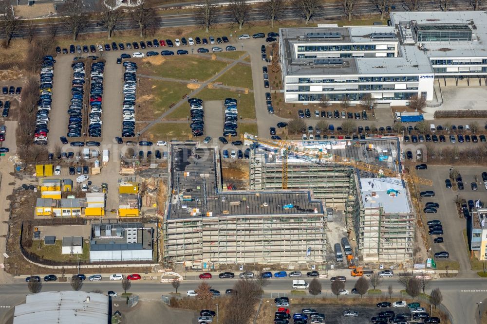 Aerial photograph Holzwickede - Construction site to build a new office and commercial building on Gottlieb-Daimler-Strasse in Holzwickede in the state North Rhine-Westphalia, Germany