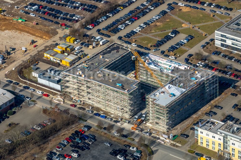 Holzwickede from above - Construction site to build a new office and commercial building on Gottlieb-Daimler-Strasse in Holzwickede in the state North Rhine-Westphalia, Germany