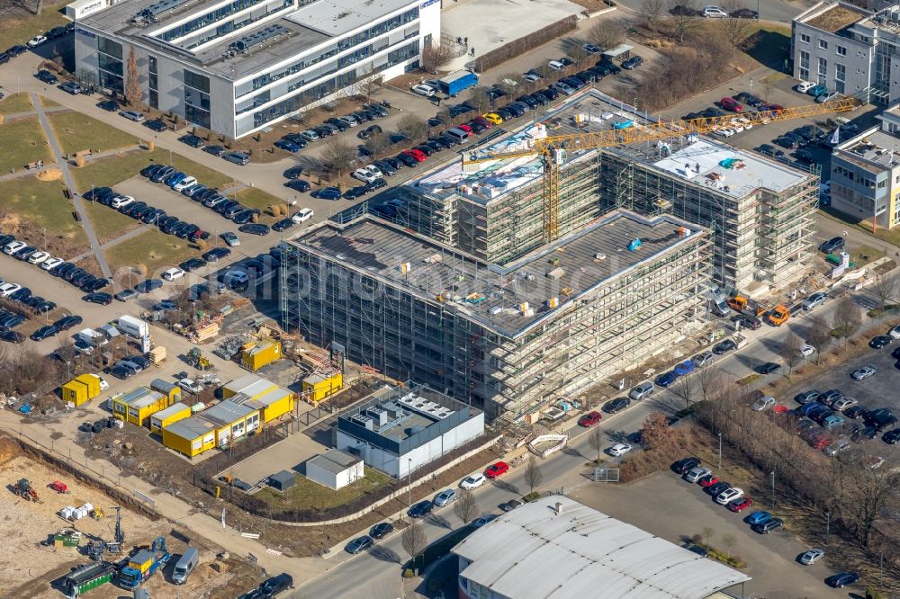 Aerial photograph Holzwickede - Construction site to build a new office and commercial building on Gottlieb-Daimler-Strasse in Holzwickede in the state North Rhine-Westphalia, Germany