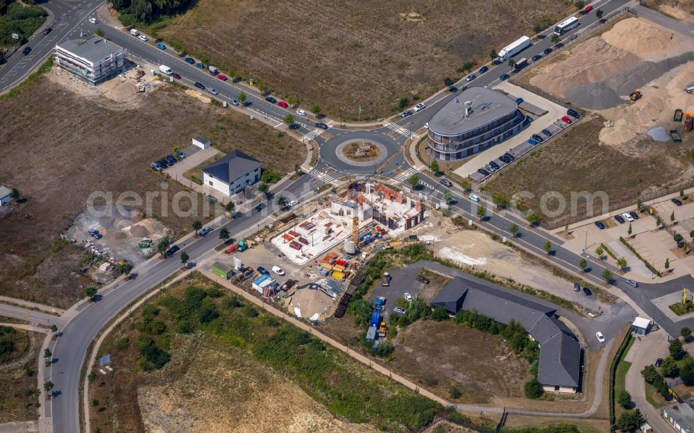 Dortmund from the bird's eye view: Construction site to build a new office and commercial building of HOFF Hohenbuschei GmbH on Hohenbuschei-Allee in Dortmund in the state North Rhine-Westphalia, Germany