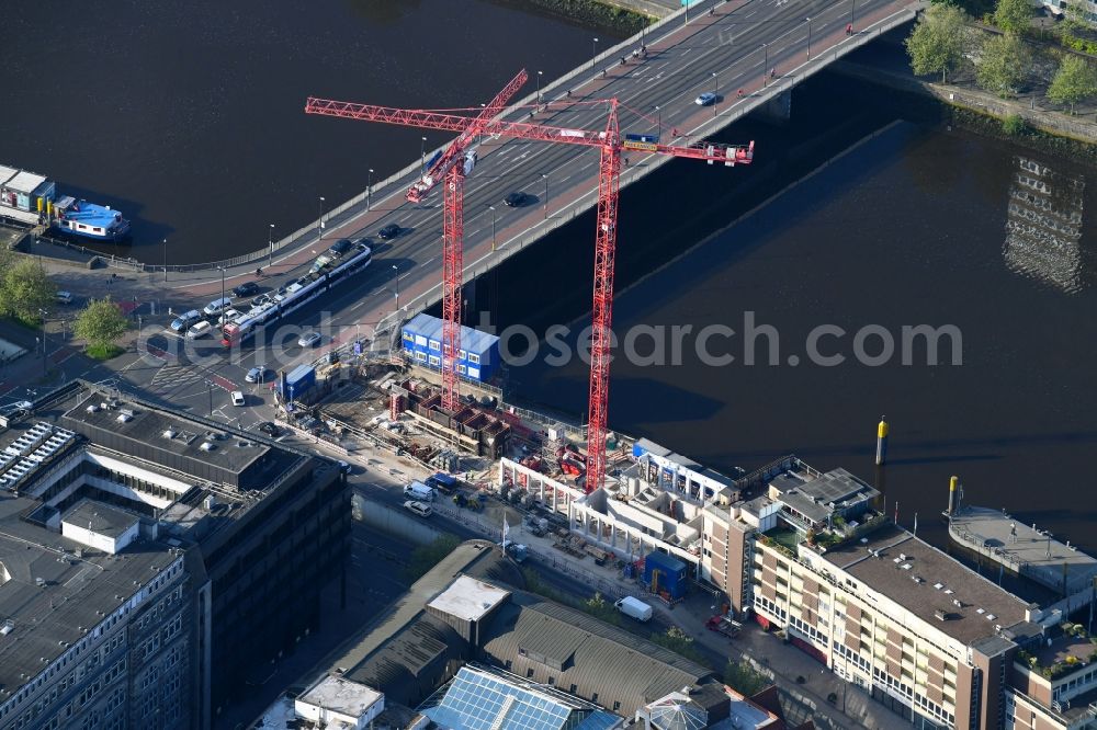 Bremen from the bird's eye view: Construction site to build a new office and commercial building of Kuehne + Nagel (AG & Co.) KG on Martinistrasse in Bremen, Germany