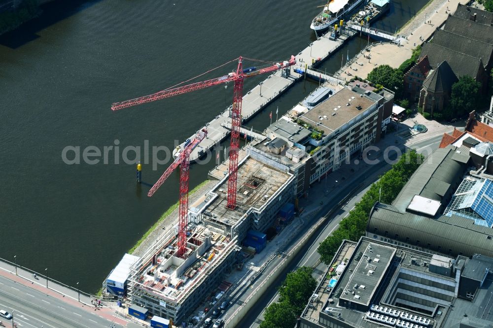 Bremen from the bird's eye view: Construction site to build a new office and commercial building of Kuehne + Nagel (AG & Co.) KG on Martinistrasse in Bremen, Germany