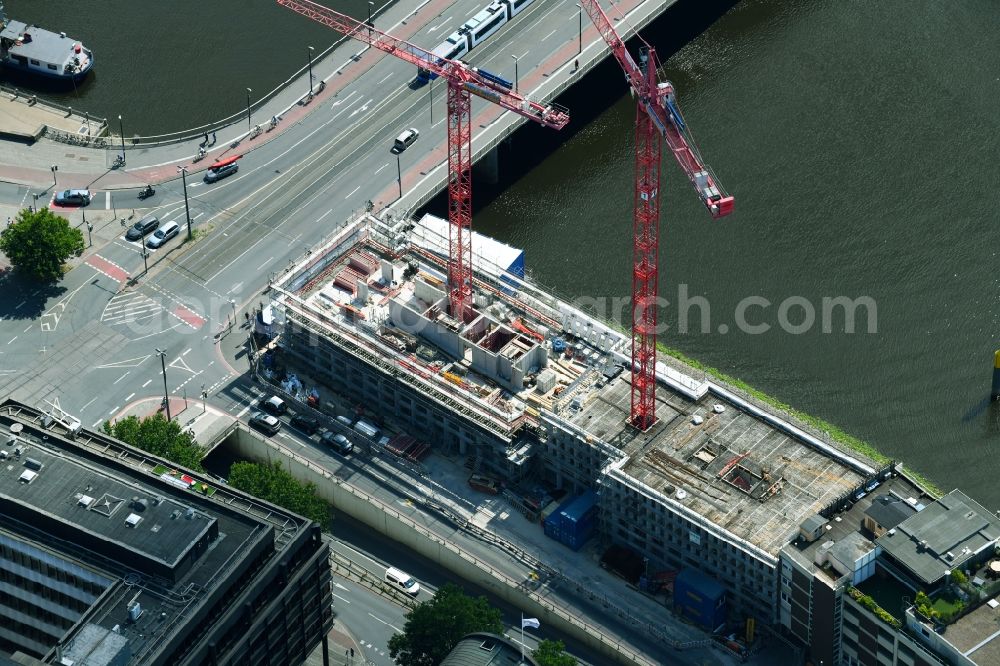 Bremen from the bird's eye view: Construction site to build a new office and commercial building of Kuehne + Nagel (AG & Co.) KG on Martinistrasse in Bremen, Germany