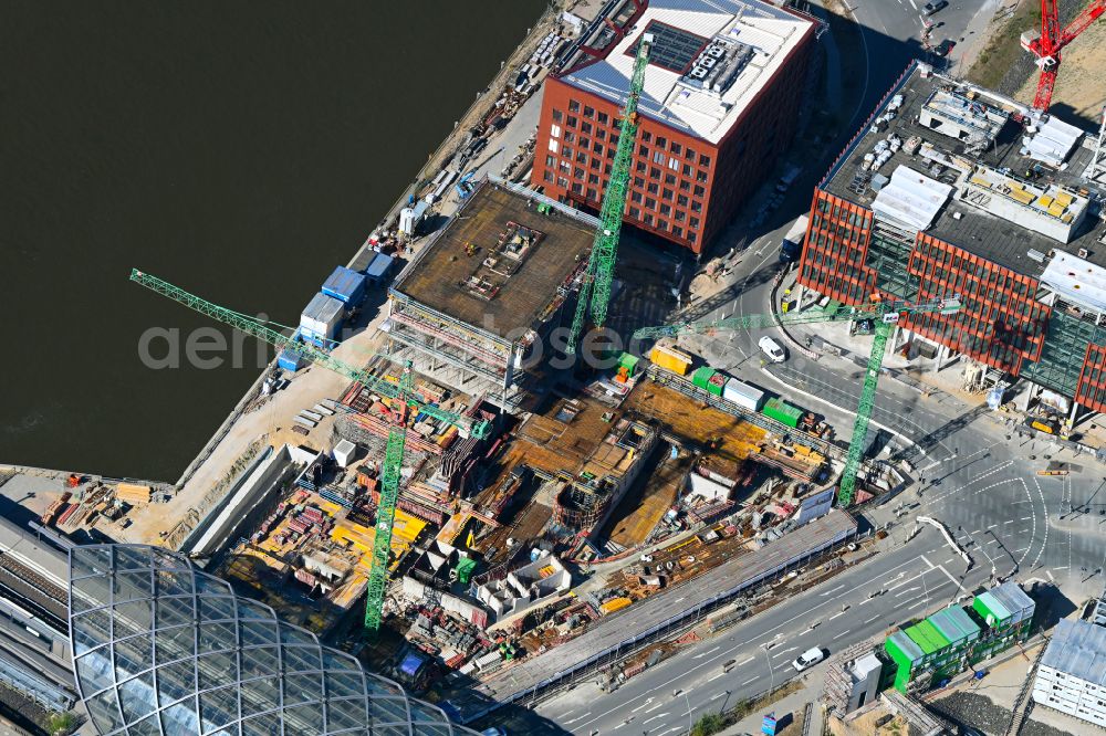 Hamburg from the bird's eye view: Construction site for a new office and commercial building on Kirchenpauerstrasse - Zweibrueckenstrasse in the Elbbruecken district at the Braakenhafen in the district HafenCity in Hamburg, Germany