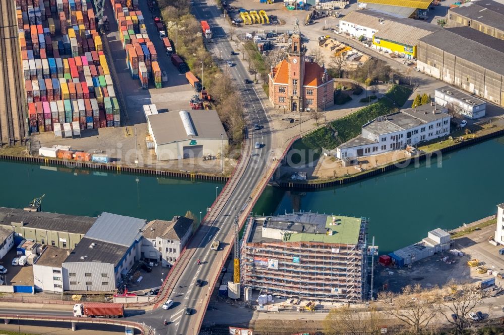 Dortmund from the bird's eye view: Construction site to build a new office and commercial building Leuchtturm in the district Hafen in Dortmund at Ruhrgebiet in the state North Rhine-Westphalia, Germany