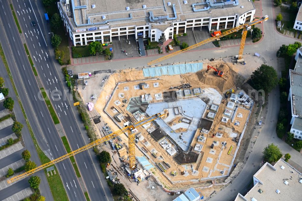 Waltersdorf from the bird's eye view: Construction site to build a new office and commercial building of Lilienthal-Park on Gruenauer Strasse and Lilienthalstrasse in Waltersdorf in the state Brandenburg, Germany