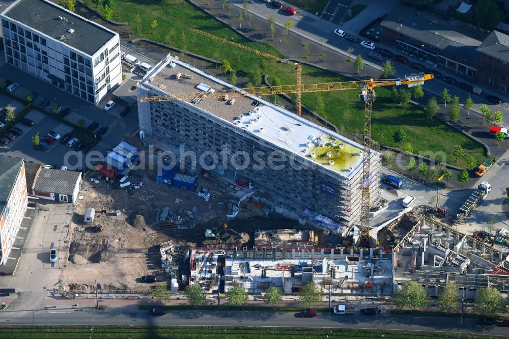 Bremen from the bird's eye view: Construction site to build a new office and commercial building Justus Grosse GmbH Auf of Muggenburg in Bremen, Germany