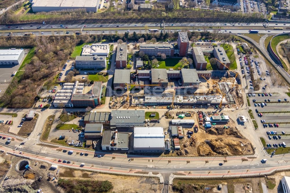 Essen from the bird's eye view: Construction site to build a new office and commercial building of TUeV NORD AG Am Technologiepark in the district Frillendorf in Essen in the state North Rhine-Westphalia, Germany