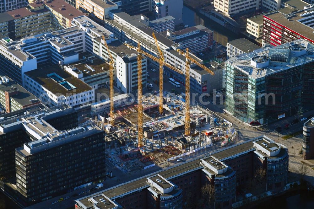 Hamburg from the bird's eye view: Construction site to build a new office and commercial building of Olympus Campus on Heidenkonpsweg - Wendenstrasse in Hamburg, Germany