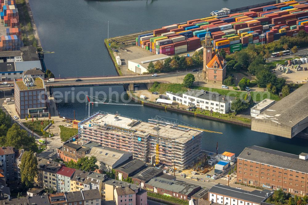 Aerial photograph Dortmund - Construction site to build a new office and commercial building on street Speicherstrasse - Hafenpromenade in the district Hafen in Dortmund at Ruhrgebiet in the state North Rhine-Westphalia, Germany