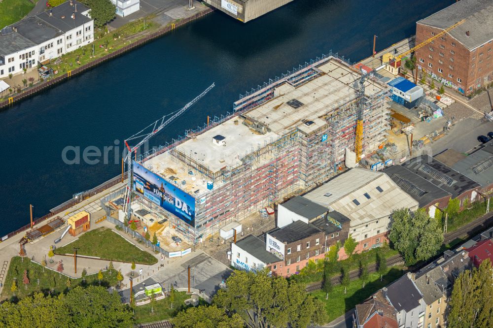 Aerial image Dortmund - Construction site to build a new office and commercial building on street Speicherstrasse - Hafenpromenade in the district Hafen in Dortmund at Ruhrgebiet in the state North Rhine-Westphalia, Germany