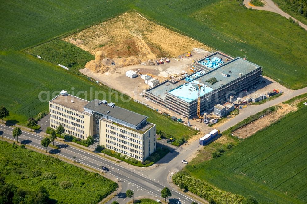 Aerial photograph Dortmund - Construction site to build a new office and commercial building Ernst-Abbe-Strasse - Brennaborstrasse in the district Luetgendortmund in Dortmund in the state North Rhine-Westphalia, Germany