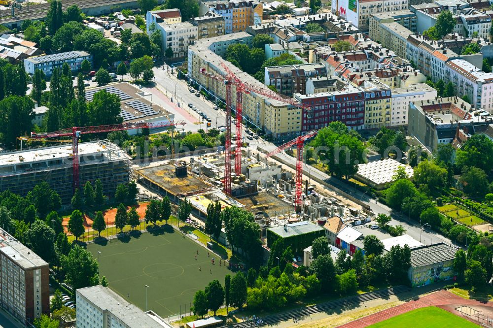 Berlin from the bird's eye view: Construction site to build a new office and commercial building PANDION OFFICEHOME Ostkreuz Campus A on street Boedikerstrasse in the district Friedrichshain in Berlin, Germany