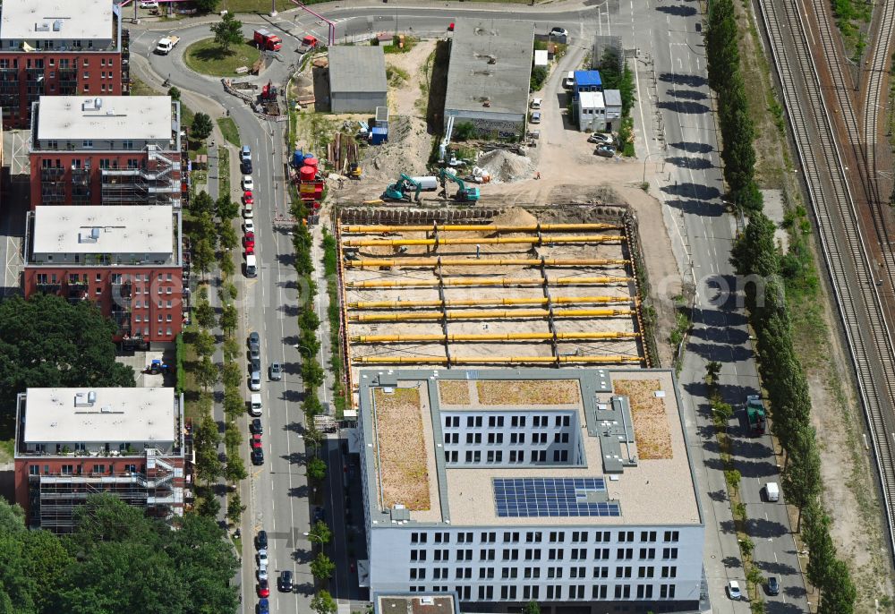 Aerial photograph Potsdam - Construction site to build a new office and commercial building on street Babelsberger Strasse in Potsdam in the state Brandenburg, Germany