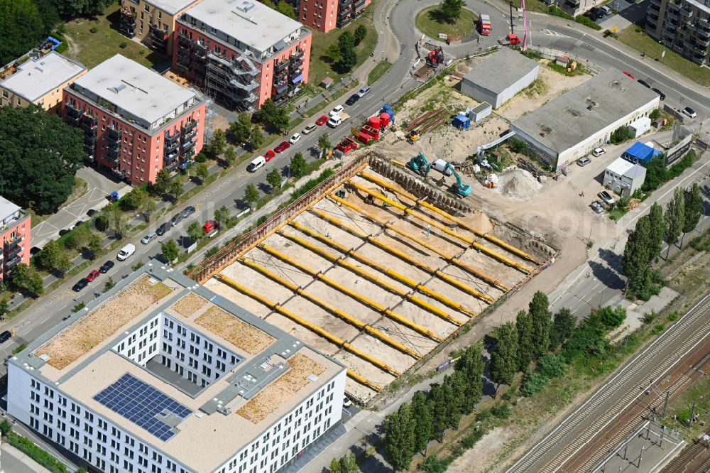 Potsdam from the bird's eye view: Construction site to build a new office and commercial building on street Babelsberger Strasse in Potsdam in the state Brandenburg, Germany