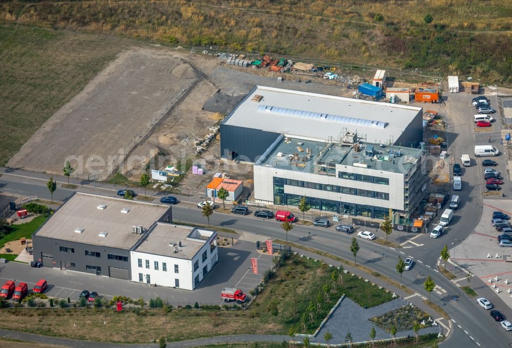 Gelsenkirchen from the bird's eye view: Construction site to build a new office and commercial building of Purax GmbH on Johannes-Rau-Allee in Gelsenkirchen in the state North Rhine-Westphalia, Germany