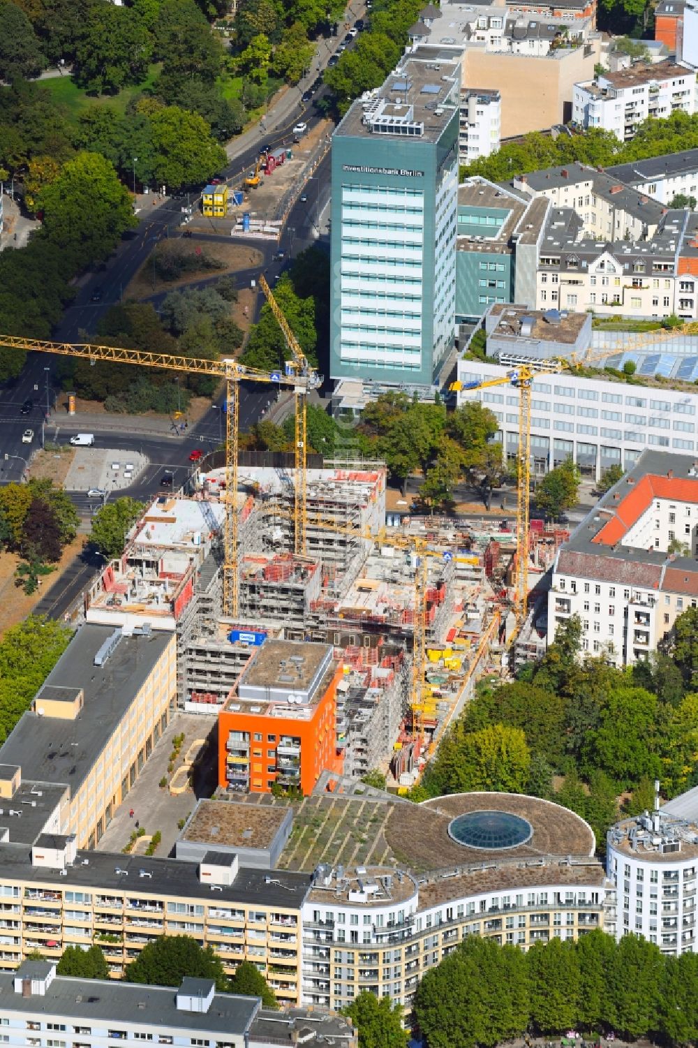 Berlin from the bird's eye view: Construction site to build a new office and commercial building Quartier Bundesallee on Bundesallee corner Nachodstrasse in Berlin, Germany