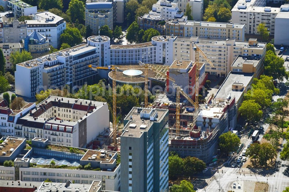 Berlin from the bird's eye view: Construction site to build a new office and commercial building Quartier Bundesallee on Bundesallee corner Nachodstrasse in Berlin, Germany