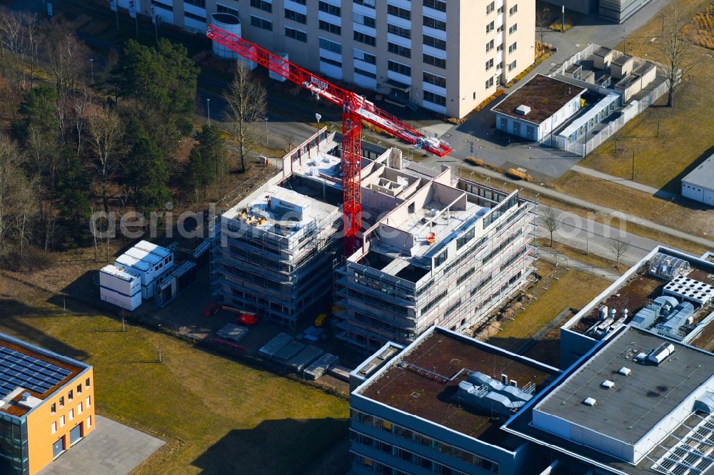 Aerial image Berlin - Construction site to build a new office and commercial building on Richard-Willstaetter-Strasse in the district Adlershof in Berlin, Germany