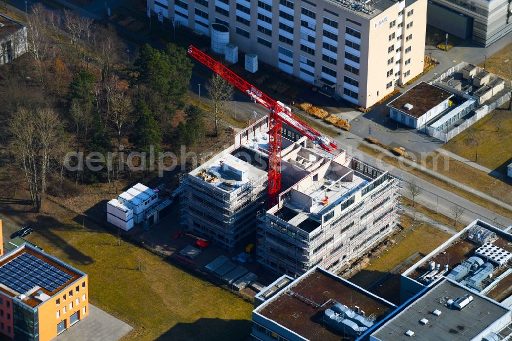 Aerial photograph Berlin - Construction site to build a new office and commercial building on Richard-Willstaetter-Strasse in the district Adlershof in Berlin, Germany