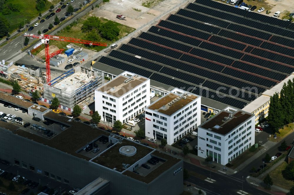 Berlin from the bird's eye view: Construction site to build a new office and commercial building Rudower Chaussee in the district Adlershof in Berlin, Germany