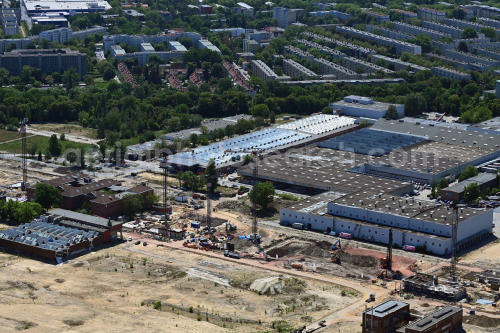 Berlin from the bird's eye view: Construction site to build a new office and commercial building SIEMENSSTADT SQUARE on street Gartenfelder Strasse in the district Siemensstadt in Berlin, Germany