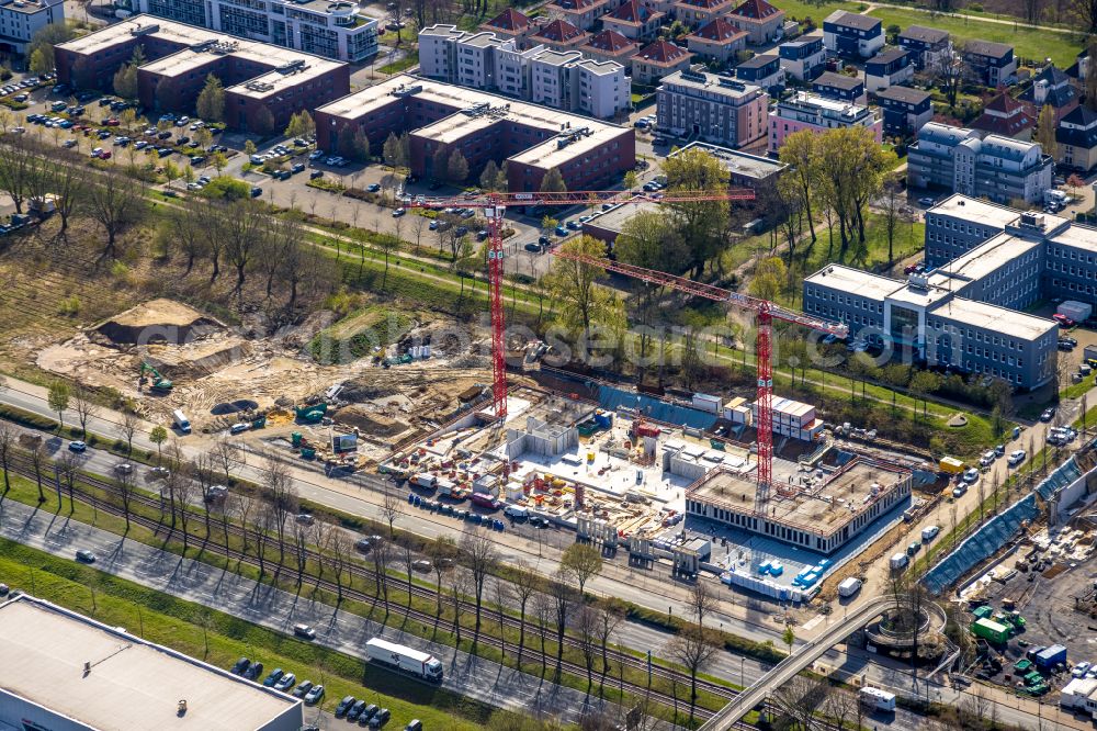 Dortmund from above - Construction site to build a new office and commercial building SKOFFICE by Stadtkrone-Ost on street Freie-Vogel-Strasse in the district Schueren-Neu in Dortmund at Ruhrgebiet in the state North Rhine-Westphalia, Germany