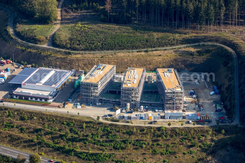 Siegen from the bird's eye view: Construction site to build a new office and commercial building Summit on Martinshardt in Siegen in the state North Rhine-Westphalia, Germany