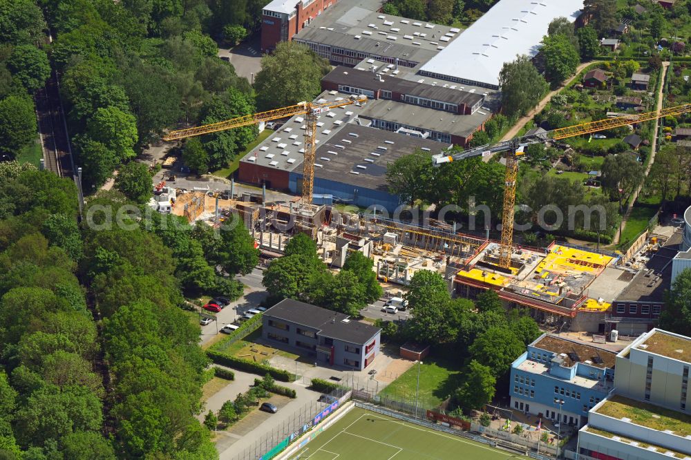 Aerial image Hamburg - Construction site to build a new office and commercial building of TK Techniker Krankenkasse on street Bramfelder Strasse in the district Barmbek in Hamburg, Germany