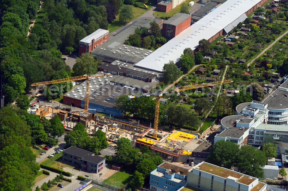 Hamburg from above - Construction site to build a new office and commercial building of TK Techniker Krankenkasse on street Bramfelder Strasse in the district Barmbek in Hamburg, Germany