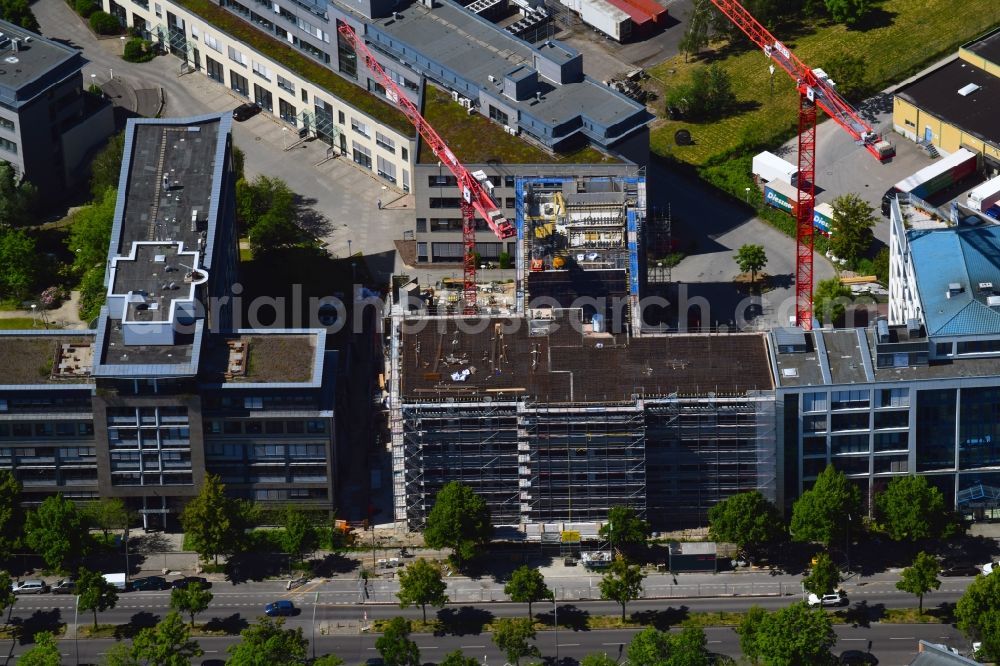 Berlin from the bird's eye view: Construction site to build a new office and commercial building on Tempelhofer Weg in the district Britz in Berlin, Germany