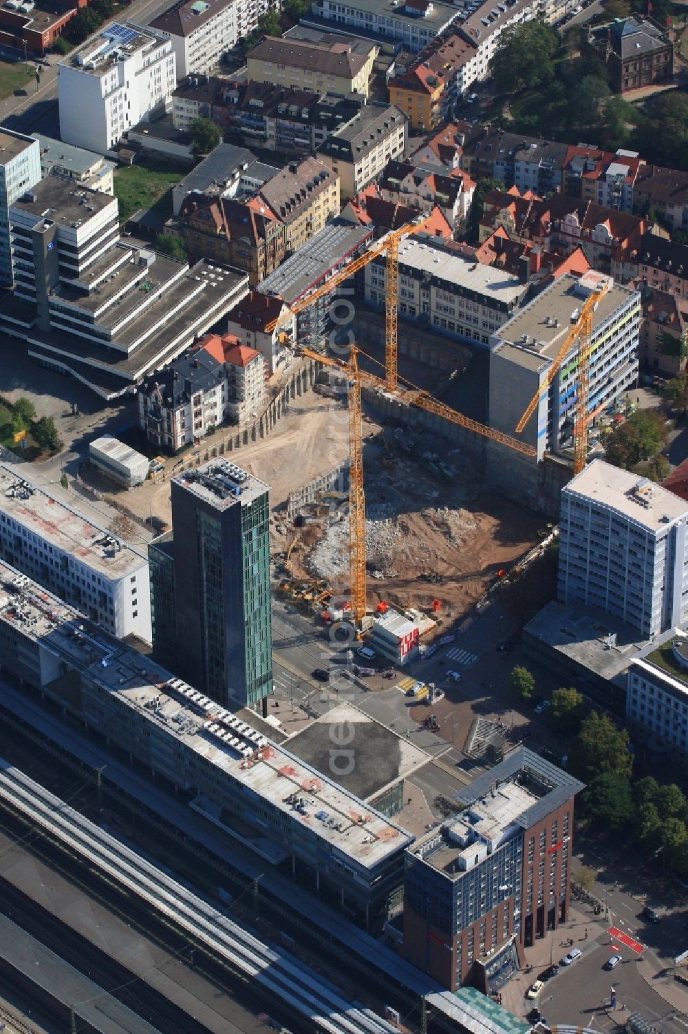 Aerial photograph Freiburg im Breisgau - Construction site to build a new office and commercial building of Volksbank Freiburg and the assembly hall of St. Ursula grammar school on Bismarckallee - Eisenbahnstrasse in Freiburg im Breisgau in the state Baden-Wurttemberg, Germany