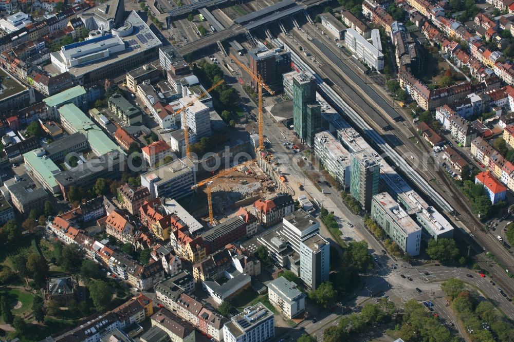 Freiburg im Breisgau from the bird's eye view: Construction site to build a new office and commercial building of Volksbank Freiburg and the assembly hall of St. Ursula grammar school on Bismarckallee - Eisenbahnstrasse in Freiburg im Breisgau in the state Baden-Wurttemberg, Germany