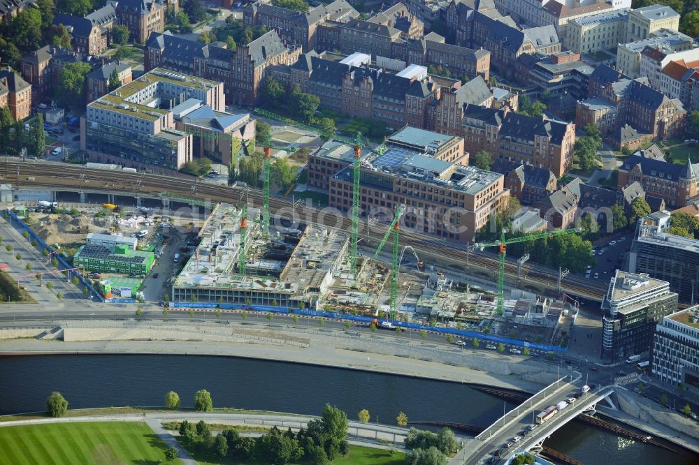 Aerial image Berlin - Construction site view at the new building of the second office of the Federal Ministry of Education and Research at the Kapellenweg / Alexan derufer in the district of Mitte in Berlin. Responsible is the Thomas Müller Ivan Reimann Society of Architects Ltd., executive construction company the BAM Germany AG