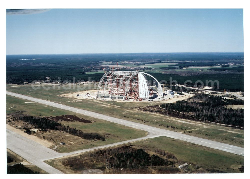 Krausnick from the bird's eye view: Construction site for the new construction of the Cargolifterhalle as an airship hangar in Krausnick in the state Brandenburg, Germany