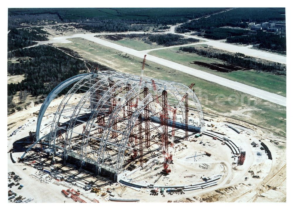 Aerial photograph Krausnick - Construction site for the new construction of the Cargolifterhalle as an airship hangar in Krausnick in the state Brandenburg, Germany