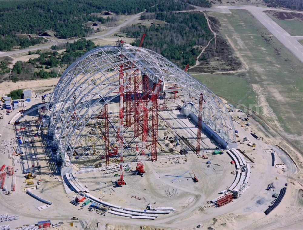 Krausnick from the bird's eye view: Construction site for the new construction of the Cargolifterhalle as an airship hangar in Krausnick in the state Brandenburg, Germany