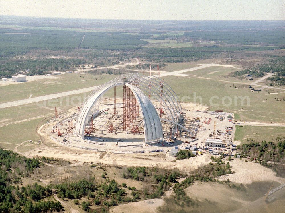 Krausnick from the bird's eye view: Construction site for the new construction of the Cargolifterhalle as an airship hangar in Krausnick in the state Brandenburg, Germany