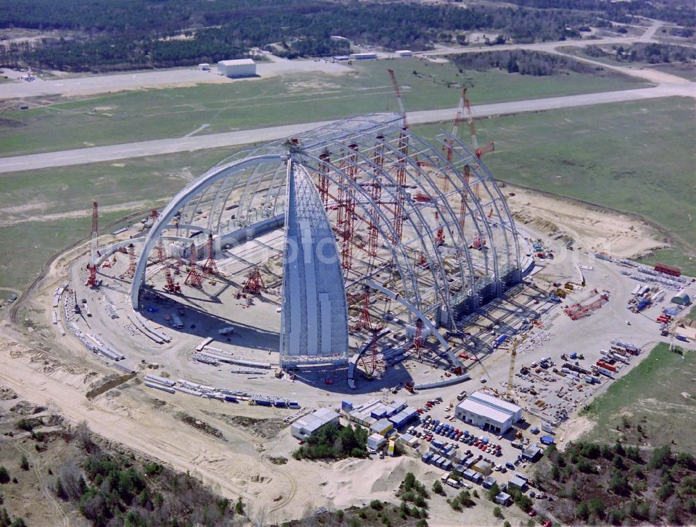 Krausnick from the bird's eye view: Construction site for the new construction of the Cargolifterhalle as an airship hangar in Krausnick in the state Brandenburg, Germany