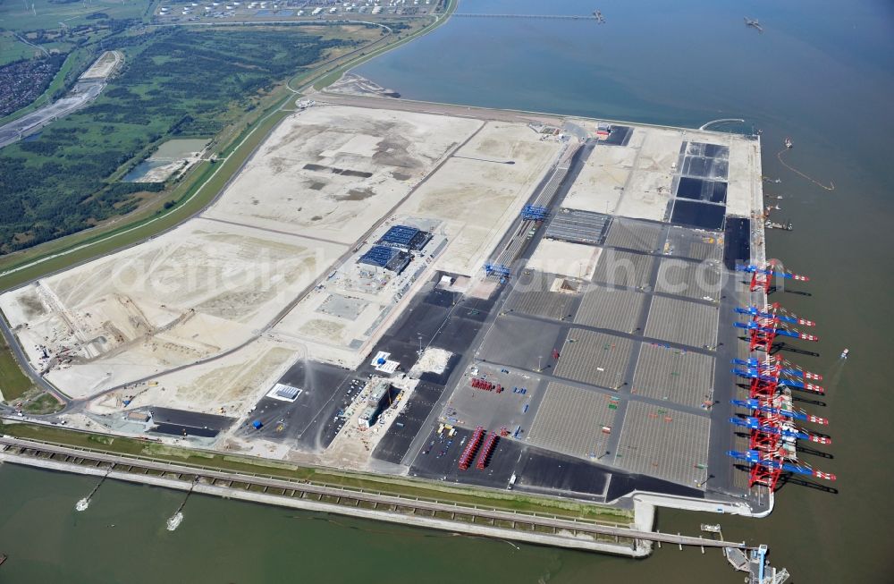 Wilhelmshaven from above - Construction site of Container Terminal in the port of the international port of Jade Weser Port ( JWP ) on the North Sea in Wilhelmshaven in the state Lower Saxony, Germany