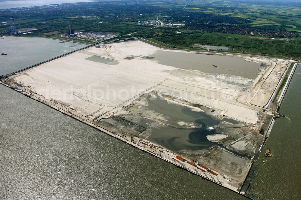 Aerial image Wilhelmshaven - Construction site of Container Terminal in the port of the international port of Jade Weser Port ( JWP ) on the North Sea in Wilhelmshaven in the state Lower Saxony, Germany