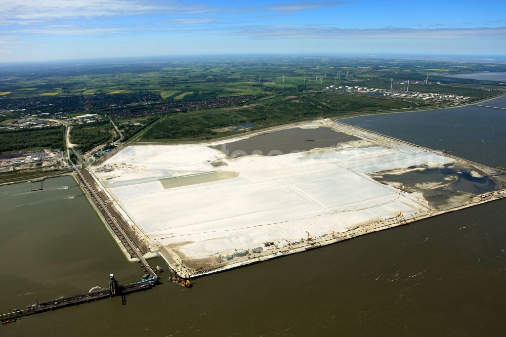 Aerial photograph Wilhelmshaven - Construction site of Container Terminal in the port of the international port of Jade Weser Port ( JWP ) on the North Sea in Wilhelmshaven in the state Lower Saxony, Germany