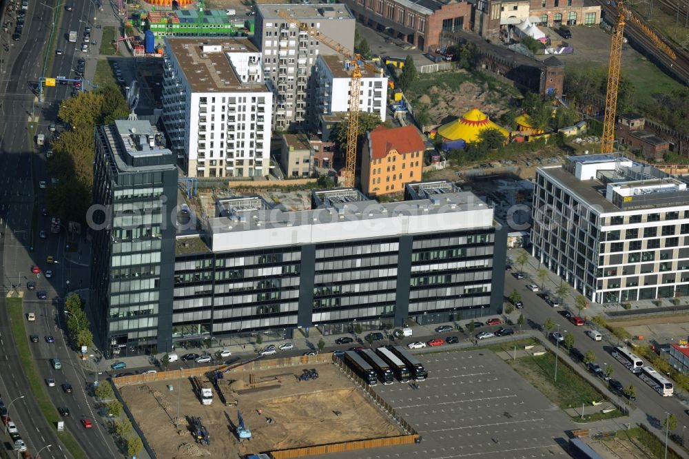 Berlin from above - View the new building of the new german headquarter of Mercedes-Benz Distribution Germany on the site of the project Media Spree in the district Kreuzberg-Friedrichshain in Berlin. CA Immo joins the project both as a client as well as an investor. Operating construction enterprise is the company Zueblin