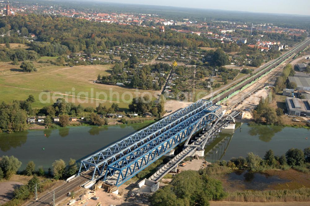 Aerial photograph RATHENOW - Blick auf die Arbeiten zum Neubau der Eisenbahnüberführung Havelbrücke Rathenow. In einer 1. Phase wurde die bestehende Brücke zurückgebaut, um Baufreiheit für die Ortsumfahrung B 188 Rathenow zu schaffen. Anschließend wird die dafür notwendige Straßenüberführung an gleicher Stelle errichtet. Die neue Havelbrücke für den Zugverkehr wird in veränderter Lage erbaut. Bis zum Dezember 2009 werden die Brückenbauarbeiten andauern. Projektsteuerung SCHÜßLERPLAN-Ingenieurgesellschaft