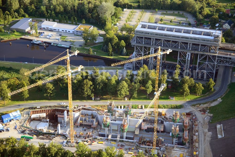 Aerial photograph Niederfinow - Blick auf die Baustelle vom Neubau des Schiffshebewerk Niederfinow Nord durch die DSD Brückenbau GmbH, die Johann Bunte Bauunternehmung GmbH & Co. KG , Bilfinger Berger Ingenieurbau GmbH und die Siemag GmbH. The new building of the boat lift Niederfinow.