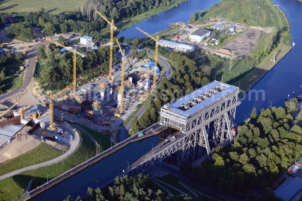 Aerial photograph Niederfinow - Blick auf die Baustelle vom Neubau des Schiffshebewerk Niederfinow Nord durch die DSD Brückenbau GmbH, die Johann Bunte Bauunternehmung GmbH & Co. KG , Bilfinger Berger Ingenieurbau GmbH und die Siemag GmbH. The new building of the boat lift Niederfinow.