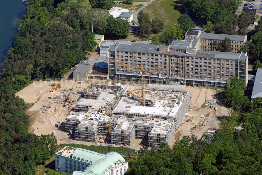 Aerial image Rüdersdorf - Blick auf die Baustelle des Krankenhaus Neubaus des Evangelisch-Freikirchlichen Krankenhaus Rüdersdorf. Im Hintergrund das alte Bettenhaus mit sämtlichen Nebengebäuden aus den 60er-Jahren, welches nach dem Umzug in das neue Gebäude abgerissen wird. Auf dem Gelände wird dann der Park des Krankenhauses entstehen, u. a. mit einem Kinderspielplatz und Medizinalkräutergarten. Das neue drei- und viergeschossige Krankenhaus hat eine Kapazität für 287 Betten in 135 Patientenzimmern. Kontakt: Krankenhaus und Poliklinik Rüdersdorf GmbH, Seebad 82/83, 15562 Rüdersdorf, Tel. +49(0)33638 83 0, Fax +49(0)33638 83 228, E-Mail: info @krankenhaus-ruedersdorf.de; Kontakt: Immanuel Diakonie GmbH (Holding), Am Kleinen Wannsee 5, 14109 Berlin, Tel. +490)30 80505 272, Fax +490)30 80505 266, E-Mail: mail@immanuel.de